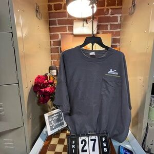 Michelin Man graphic t-shirt featuring a "Perfect Attendance" d